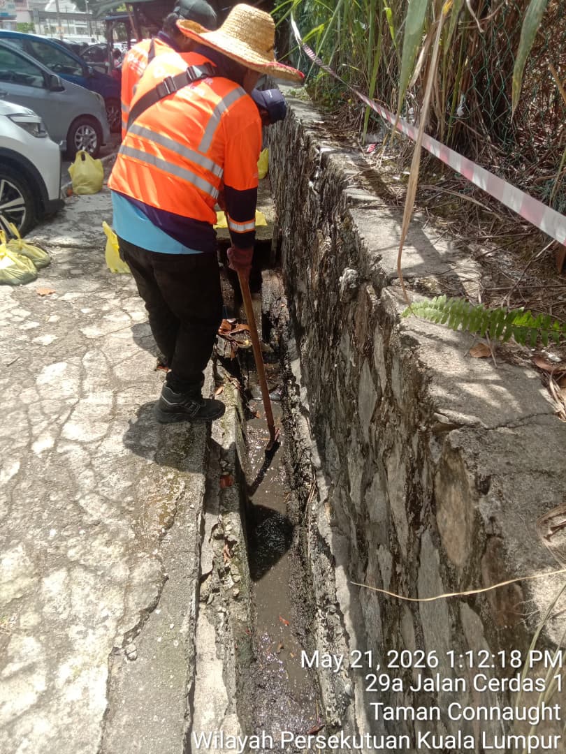 Clearing Blocked Drains and Eliminating Mosquito Breeding Grounds at Jalan Cerdas 1